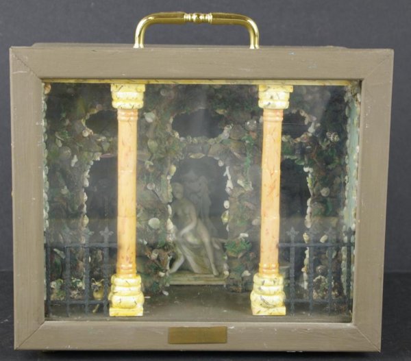 18TH CENTURY GROTTO DIORAMA: by Jeanne Knoop c.1980, depicting Florence, Italy, c.1556-1560, in a caved setting, with coral, stones, shells, ferns, mosses surrounding figural statue, a pair of fountains, columns, and two frescos 