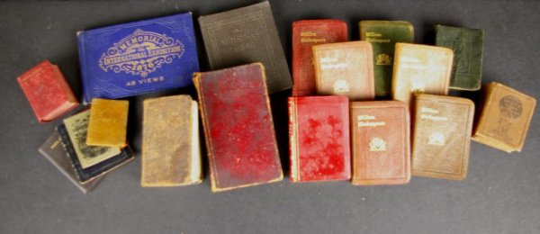 18 VOLUME COLLECTION OF MINIATURE BOOKS: most in leather, titles and subjects include Shakespeare, Methodist Hymns, Robert Burns poems, Bryce Thumb dictionary, New Testament, Paul Revere's Ride, A Christmas Carol, Philadelphia Exhibition vie