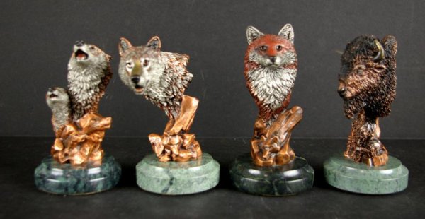 FOUR KITTY CANTRELL LEGENDS ANIMAL SCULPTURES: including "Wild Music" 101/2500, 4in., "Artful Dodger" 101/2500, 4.5in., "Spirit of the Wolf" 101/2500, 4.5in., and "Buffalo Spirit" 101/2500, 4.5in., in mixed metals, all with certificates of ownersh