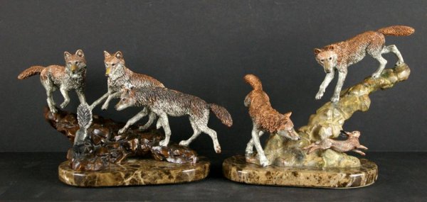 TWO KITTY CANTRELL LEGENDS WOLF SCULPTURES: including "Missed by a Hare" 454/500, 8in. and "Stink Bomb" 454/500, 7in., in mixed metals, both with certificates of ownership