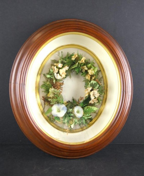 VICTORIAN SHADOW BOX FRAME WITH WAX FLOWERS: possibly a memorial piece, 17x15in.