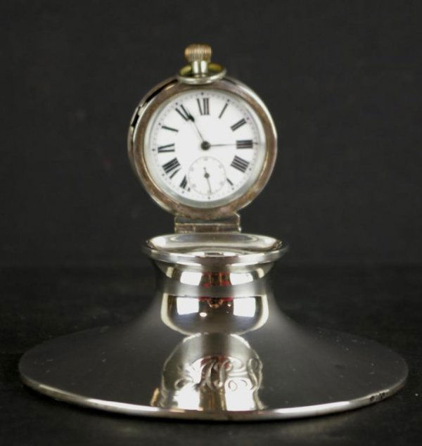 ASPREY LONDON POCKET WATCH HOLDER INKWELL: marked Asprey, English sterling, London, and with date marks for 1902, the lift-up well cover is a pocket watch holder, monogrammed, missing glass liner, 2x4.5in.