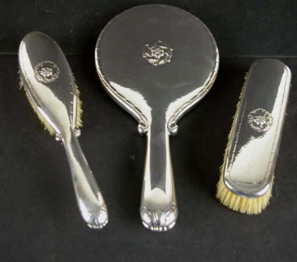 3-PIECE GEORG JENSEN STERLING VANITY SET: comprising a hand mirror, hair brush, and shoe brush, signed Georg Jensen, Denmark 79