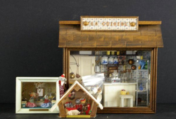 THREE DIORAMAS: "La Cuisine" miniatures include bakers rack, utility shelf unit, Dutch-style canister set, copper utensils and other various kitchenware items, "The Millinery Mouse Shop", and "Mouse Chalet", all by J