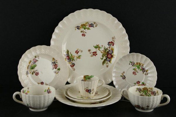 80+ PIECE PARTIAL COPELAND SPODE CHINA SERVICE: in Wicker Lane pattern, includes approx. 12 each cream soups, dinner and bread plates, 9 salad plates, 8 tea cups, 6 demitasse cups, 10 demitasse saucers, and 20 cream soup/tea saucers