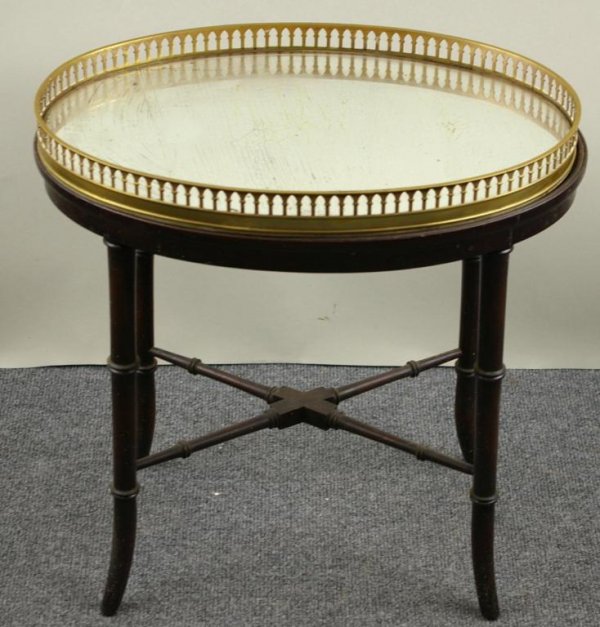 BAMBOO-STYLE TRAY-TOP ACCENT TABLE: in oval form having a removable mirrored tray with brass gallery (mirror silvering as is), 19x19in.