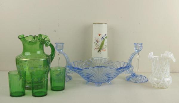 10-PIECE VICTORIAN GLASS GROUPING: including a four-piece green glass and enamel lemonade set, a three-piece blue pressed glass garniture, a Spanish lace opaline ruffled vase, a flashed ruby bird vase and a Bristol vase