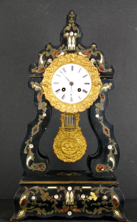 FRENCH PORTICO MANTEL CLOCK SIGNED LAINE A PARIS: ebonized wood frame with allover inlay of ivory, mother-of-pearl, tortoise shell and brass, brass dial surround, porcelain roman numeral dial and works signed Laine A Paris, minor veneer and inlay los