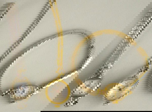 THREE VINTAGE LADIES WATCHES: including a Bulova with 14K yellow gold case, a Benrus with 14K white gold case, and a Bucherer 15 jewels pendant watch