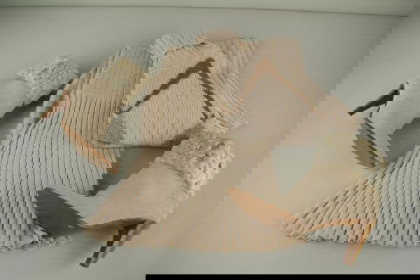 SALVATORE FERRAGAMO KNIT OUTFIT & SUEDE BOOTS: includes a short sleeve turtleneck sweater marked "88% Wool / 12% Nylon / L" with a complimenting skirt marked "100% Wool / L", and a pair of suede heeled ankle boots marked "AN03 W5Y85Z B 8 1/2"