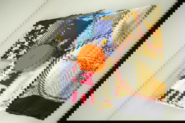 EIGHT DESIGNER SCARVES: including five Ferragamo, a Cartier, a Bvlgari, and a Hermes scarf new in original box