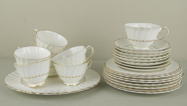 25-PIECE ROYAL DOULTON ADRIAN DESSERT SET: in white with gold foliate design and trim, including eight each 8" plates, cups and saucers, and a 10" serving plate