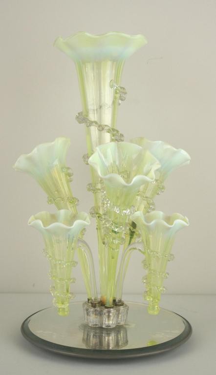 VICTORIAN OPALESCENT GLASS EPERGNE comprising six : VICTORIAN OPALESCENT GLASS EPERGNE comprising six floriform vases with applied ribbon swirl, opalescent rims, clear glass frog, mirrored base, missing one vase, 16in.