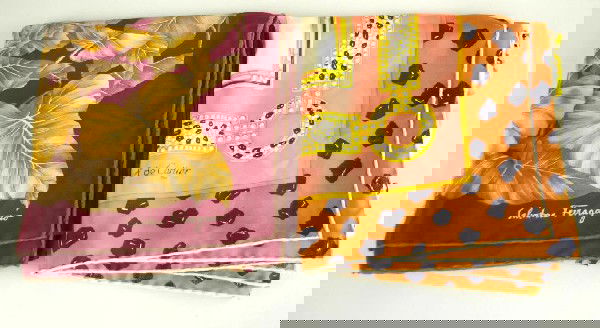 TWO DESIGNER SILK SCARVES including one by Salvato: TWO DESIGNER SILK SCARVES including one by Salvatore Ferragamo depicting a panda, and a Must de Cartier example featuring leopards and jewels