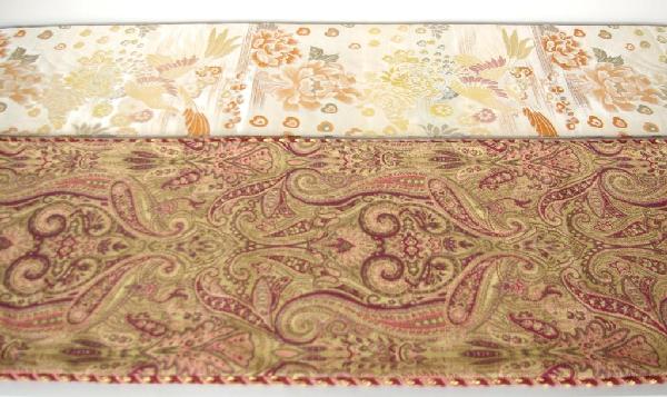 TWO CONTEMPORARY TABLE RUNNERS one in paisley desi: TWO CONTEMPORARY TABLE RUNNERS one in paisley design, 134in., the other in silk with label marked Antique Kimono Silk 100% Made in Japan, 154in.