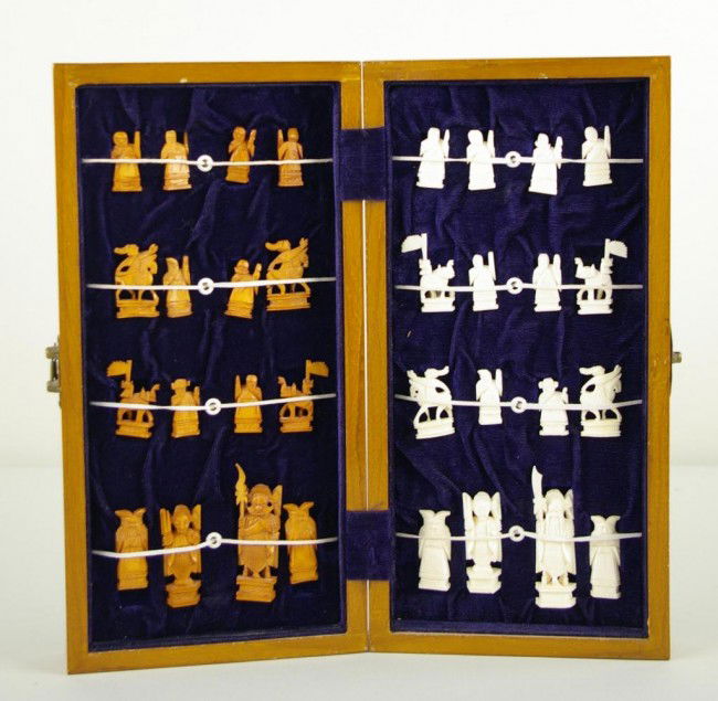 CHINESE IVORY CHESS SET IN FITTED GAME BOX natural: CHINESE IVORY CHESS SET IN FITTED GAME BOX natural and tea stained, height of King including staff 3in., game box 6.5x13in. NO INTERNATIONAL SHIPPING.