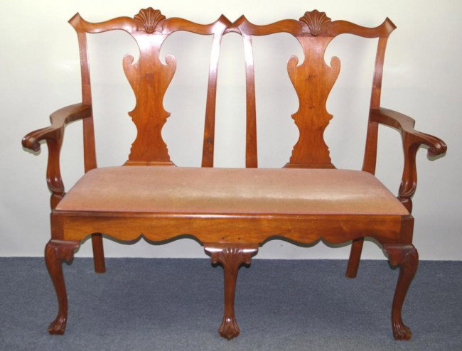 CARVED MAHOGANY SETTEE IN QUEEN ANNE STYLE branded: CARVED MAHOGANY SETTEE IN QUEEN ANNE STYLE branded mark Robert F. Filet(i)?, 40x54x22in.
