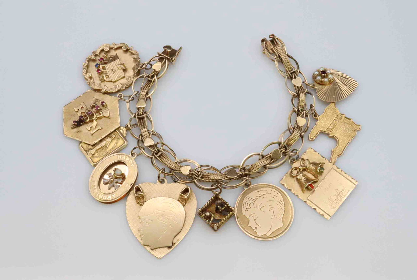 14K CHARM BRACELET WITH 10 GOLD CHARMS (1 of 4)