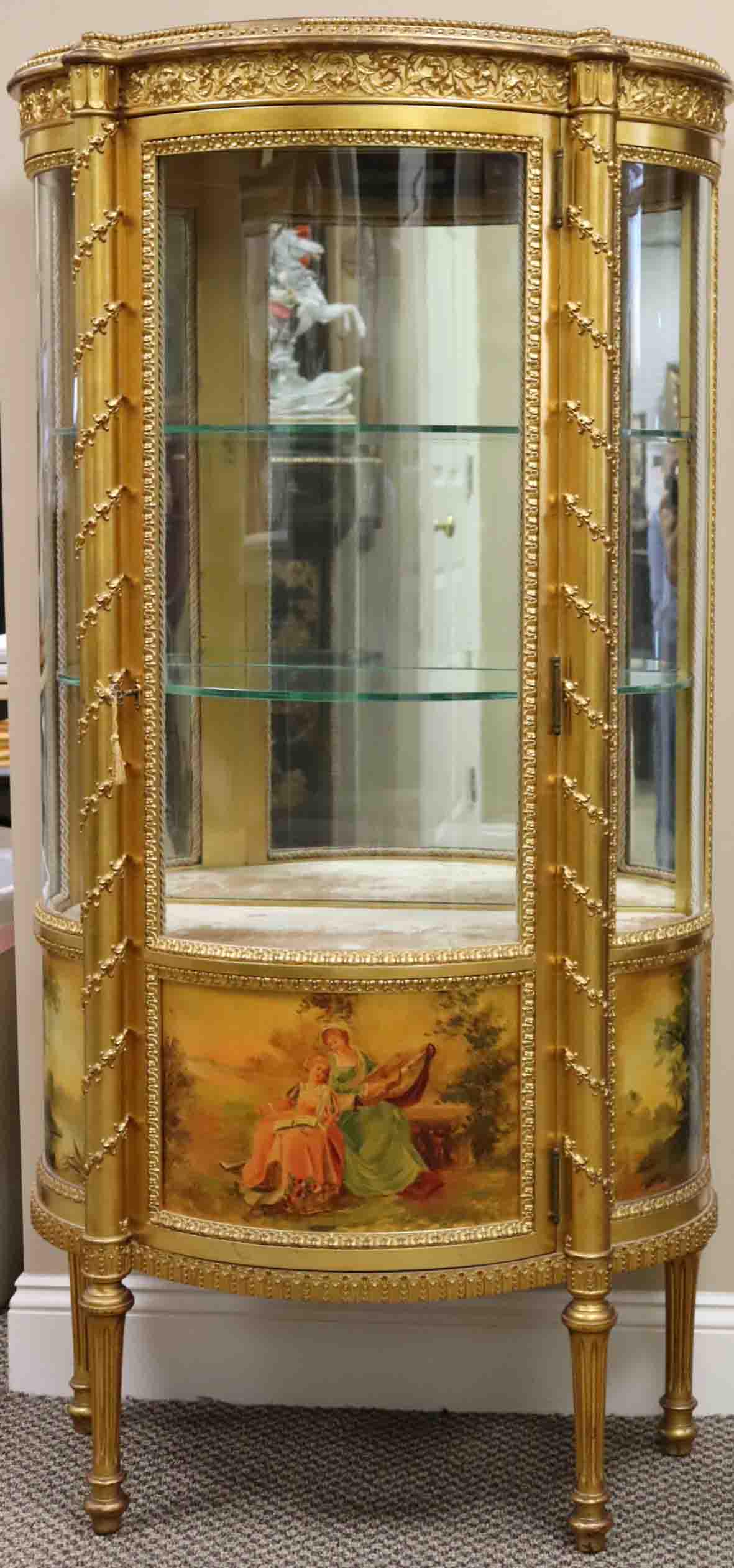 DEMURE VERNIS MARTIN STYLE VITRINE: gold painted with lower polychrome scenic panels, 2 glass shelves, velour base (velour faded and with typical indentation rings), has been electrified (interior light and exterior switch added), cabin