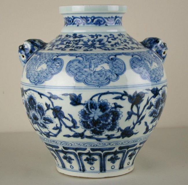 CHINESE YUAN-STYLE BLUE & WHITE BALUSTER JAR: CHINESE YUAN-STYLE BLUE & WHITE BALUSTER JAR decorated with lotus and peony scrolls, horses amongst ruyi clouds, and petal lappets, pierced lion mask knops for handle attachment , 13in.