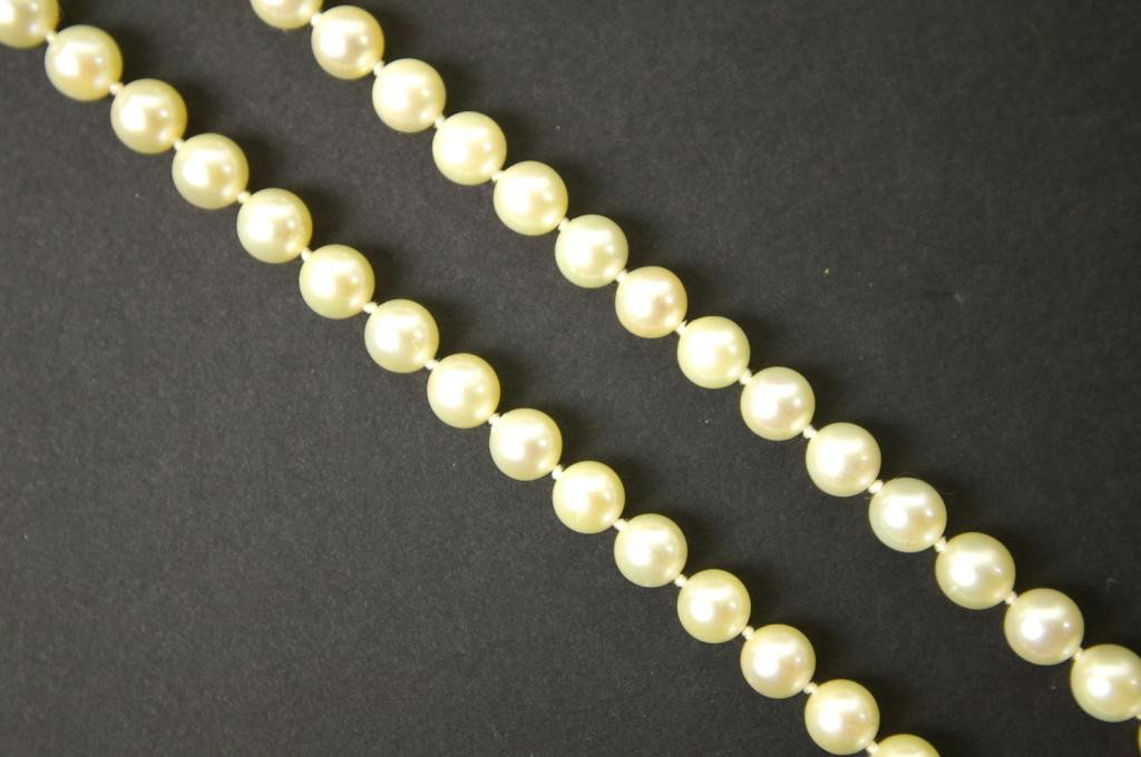 SINGLE STRAND CULTURED PEARL CHOKER: comprising 50 (6mm) pearls, 14K white gold clasp, 14in.