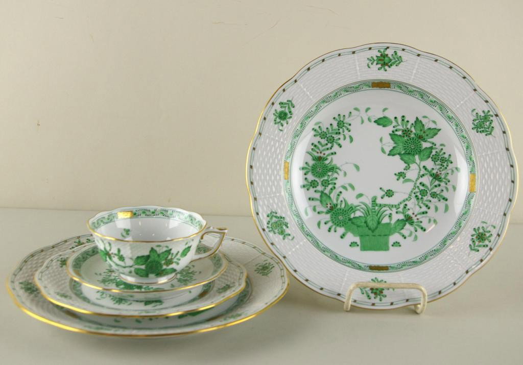 52-PIECE HEREND CHINESE BOUQUET CHINA SERVICE: in green Asian-style floral design with gilding, comprising 8 each dinner plates, salad plates, soup bowls, cups and saucers, and 12 service pieces including 2 platters (10-14in.), a covered tureen, a