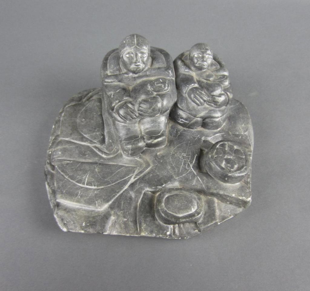 INUIT SOAPSTONE CARVING OF A FAMILY: signed on the base IVU and numbered 3-23600, 4x8x7in.