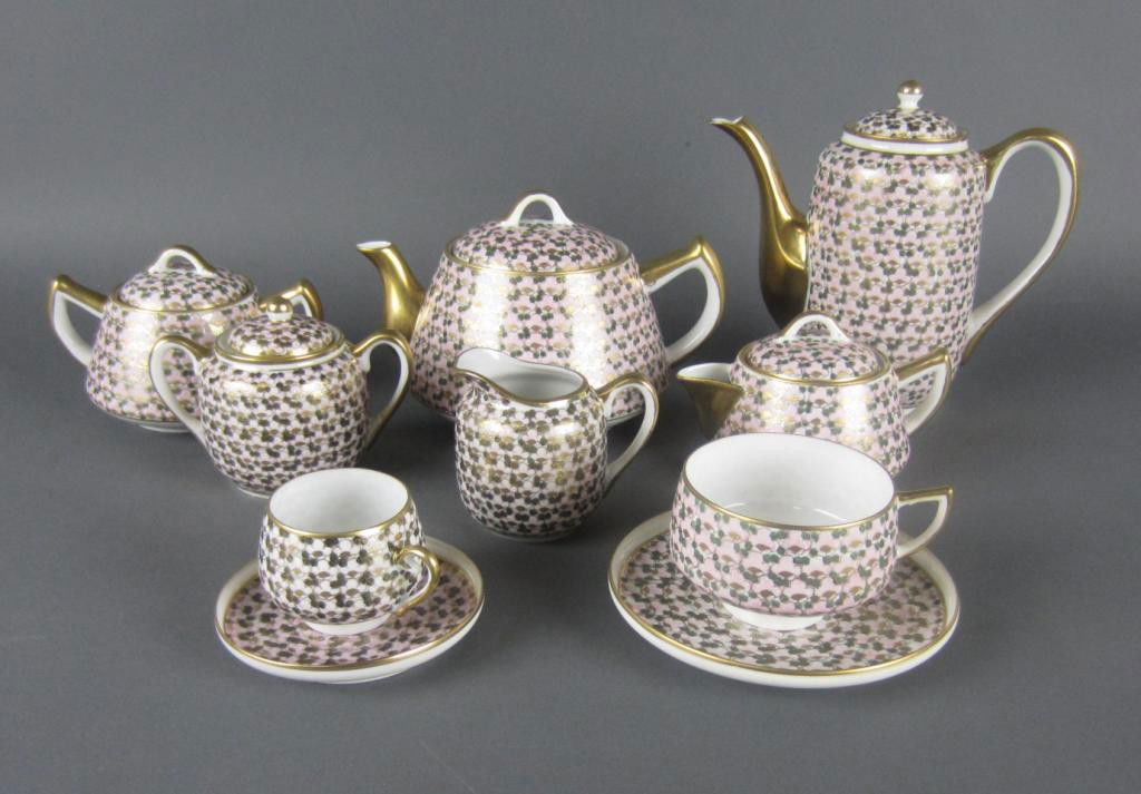 40-PIECE JAPANESE PORCELAIN COFFEE & TEA SERVICE: including a coffee pot, a teapot, 2 sugars, 2 creamers, 8 dessert plates, 5 tea cups with 6 saucers, and 8 demitasse lithopane cups with 7 saucers