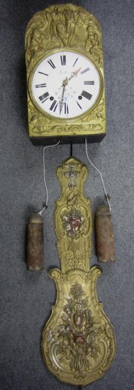EARLY FRENCH WAG ON THE WALL CLOCK: signed Sauliere, the 9" dial with painted floral spray, repousse brass designs of a courting couple and flute players, repousse pendulum with polychrome floral and bird motif, with weights, overall le