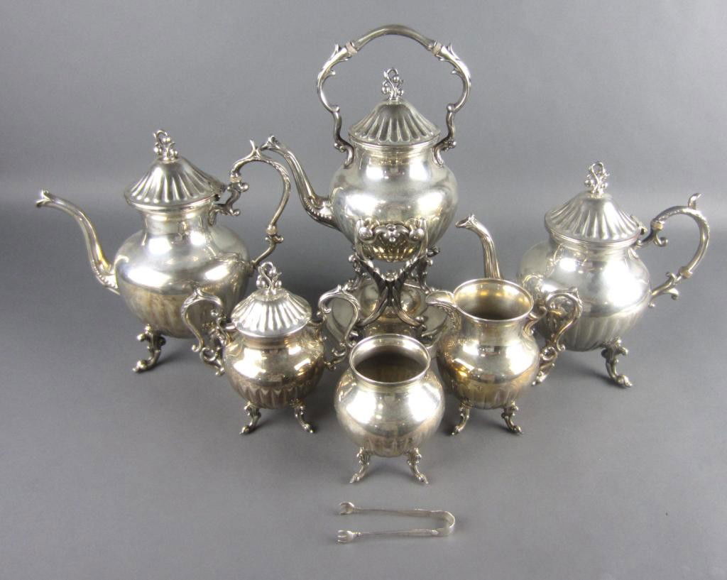 6-PIECE BIRMINGHAM SILVER CO. SILVERPLATE TEA SET: including a water kettle, coffee pot, teapot, covered sugar, creamer and waste bowl, marked B.S.C., together with a pair of International sterling tongs in Prelude pattern