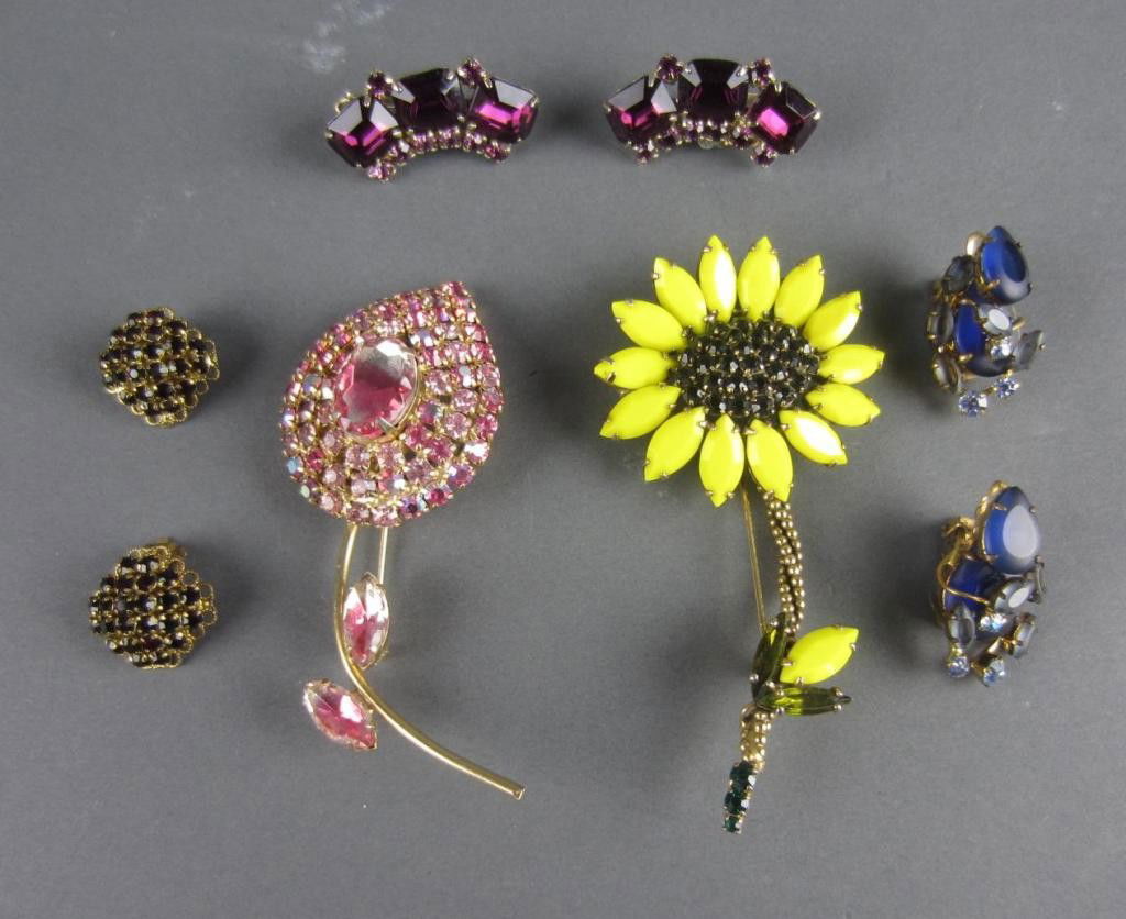 5-PIECE RHINESTONE COSTUME JEWELRY GROUP: including a Weiss sunflower pin, a pink stone floral pin, a pair of clip earrings with blue stones marked "M. West Germany", a pair of red stone clip earrings marked "Made Austria", and a pair of purp