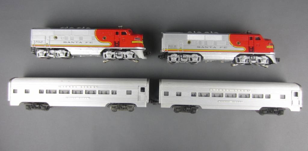 TWO LIONEL POST WAR ENGINES AND TWO PULLMANS: both engines are marked Santa Fe #2343, together with two Silver Bluff Pullman cars, both #2534