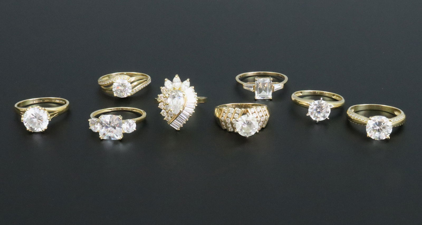 (8) 14K DIAMONIQUE CZ RINGS (1 of 2)