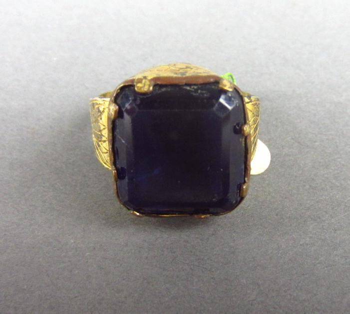 RING, RUSSIA 1760: hand-wrought ring of gilt brass, chased and set with large purple crystal, made in Russia in 1760 The above description was taken from Mr. Marino's inventory of Imperial Russian Collection, as well as