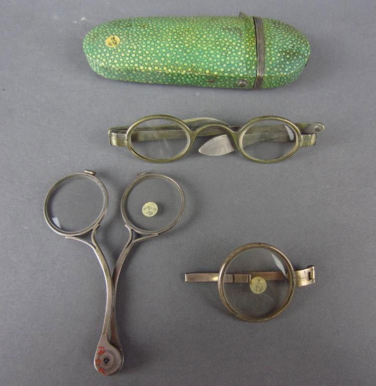 GROUP OF THREE ANTIQUE EYE GLASSES, 1800's: from curio collection of Alexander III, Winter Palace, St. Petersburg, including old spectacles of late 18th century, made in Germany, signed Unger Opticien, in original shark skin case; a single read