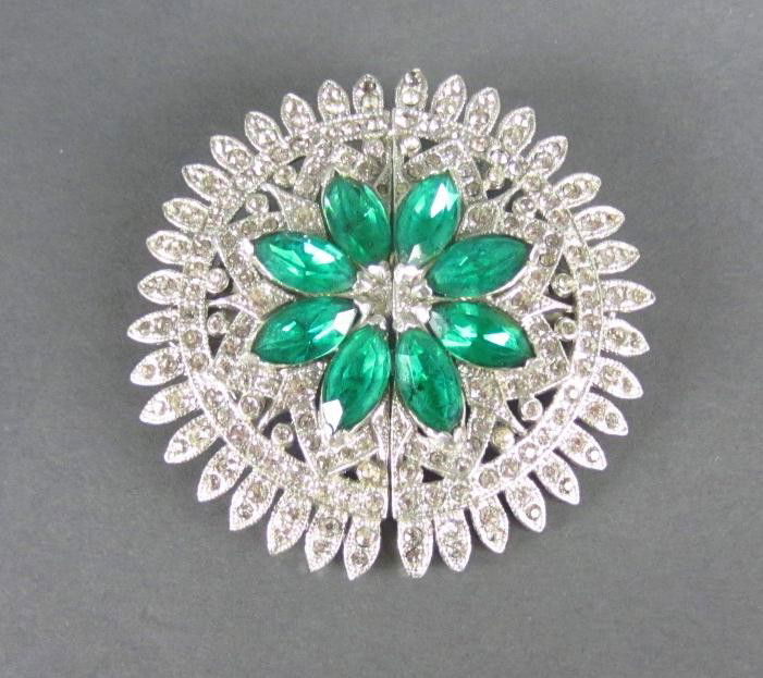 CORO DUETTE CIRCULAR FLOWER HEAD PIN: in green and white paste, signed, 2in.