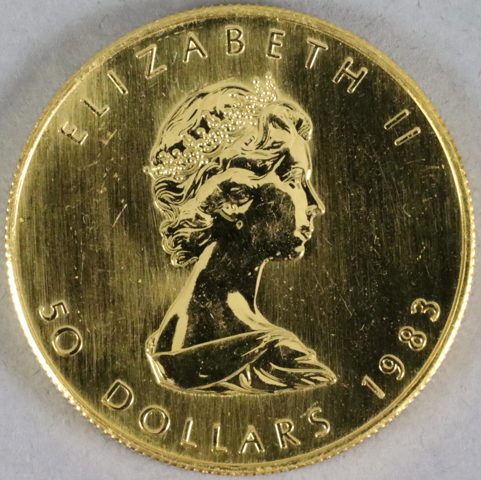 1983 CANADIAN $50 1 OUNCE MAPLE LEAF GOLD COIN (1 of 2)