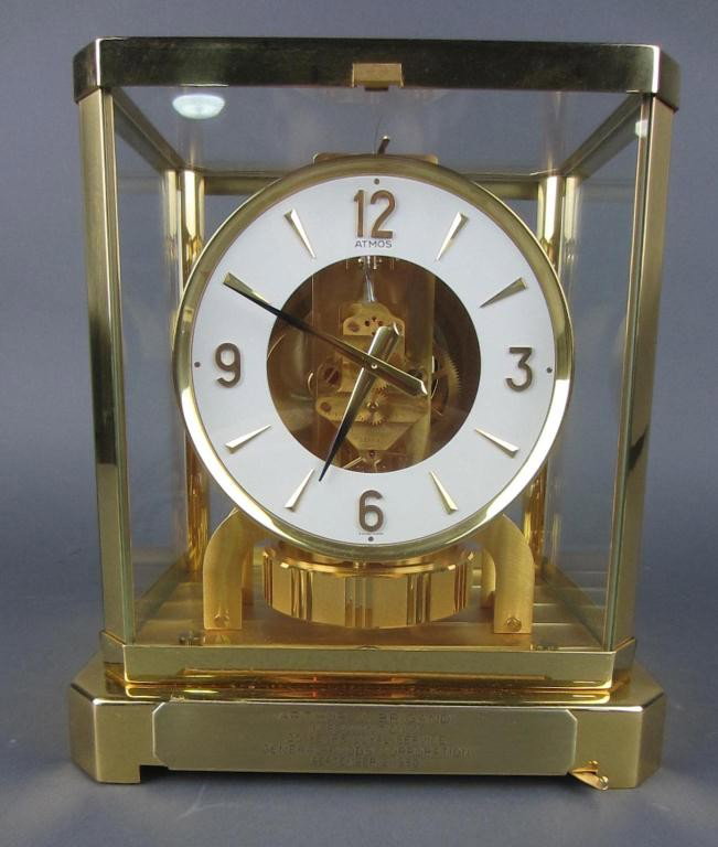 JAEGER LE COULTRE ATMOS CLOCK: presentation placard dated 1980, 9x7in. (the clock is currently running, however not guaranteed)