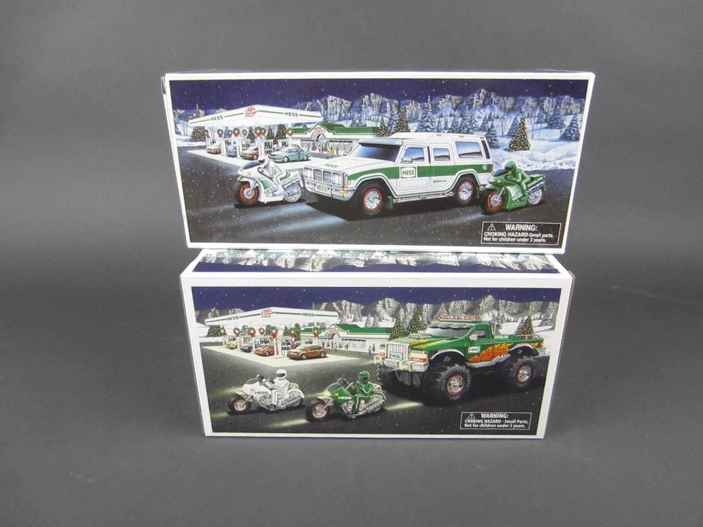 COLLECTION OF 18 HESS TRUCKS FROM THE 2000'S: all mint or near mint in original boxes, includes 3 each Toy Truck with Airplane, Toy Truck and Race Cars, Helicopter with Motorcycle and Cruiser, 2 each Fire Truck, Sport Utility Vehicle and Motorcyc