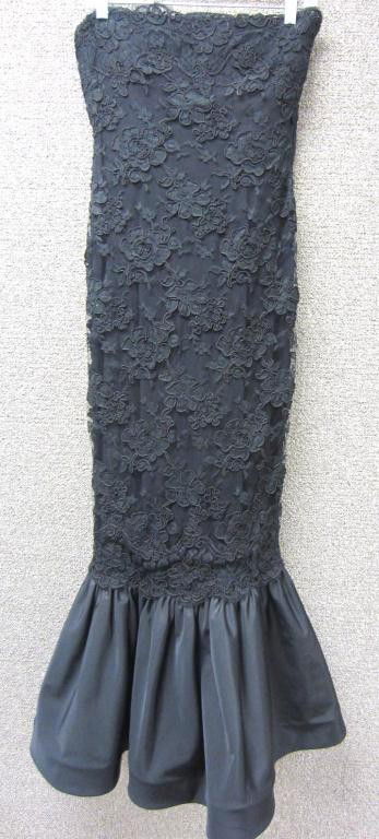 CALVIN KLEIN BLACK SILK EVENING GOWN: strapless, full-length mermaid-style shear silhouette, with label of Bergdorf Goodman at the Plaza, New York, no size (small?), sewn in bra cups, width across top of dress 15", length 49in.