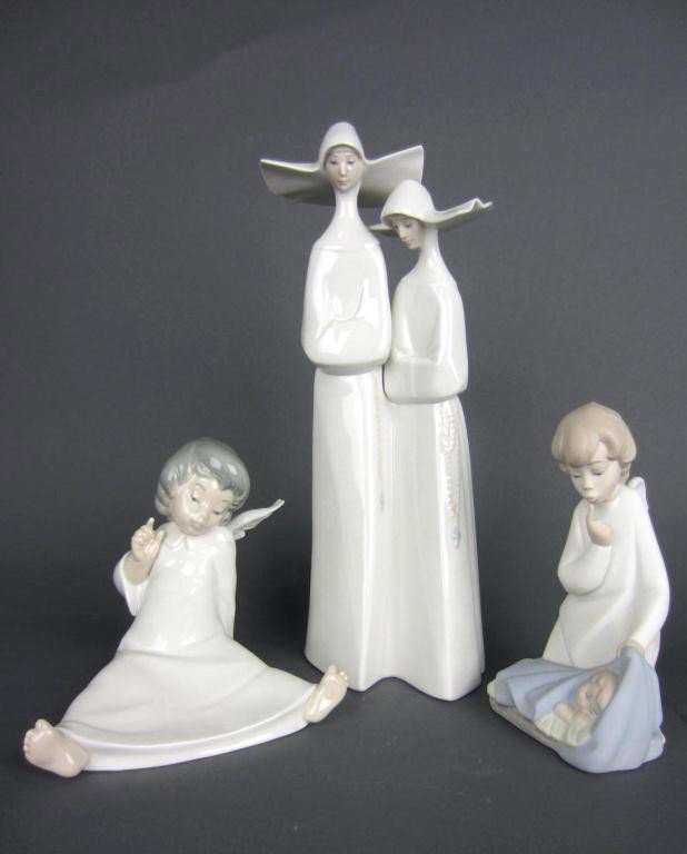 THREE RELIGIOUS-THEMED LLADRO FIGURES: including Nuns, Angel Wondering, and Angel with Baby, tallest 13in.