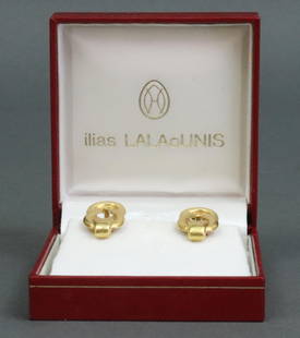 PAIR ILIAS LALAOUNIS 18K HERCULES KNOT EARRINGS: in yellow textured gold, stamped 'A21-750 Greece', Lalaounis logo, clip post backs (slight bend to one post), with gently handled presentation box, length 1in., 16.5gms., Opening Bid $600