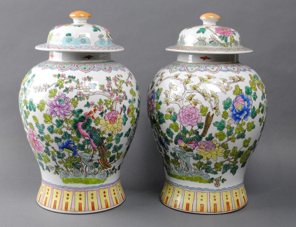 PAIR OF LARGE SIZE COVERED GINGER JARS: in famille rose palette with bird and flowering branches, 17in.