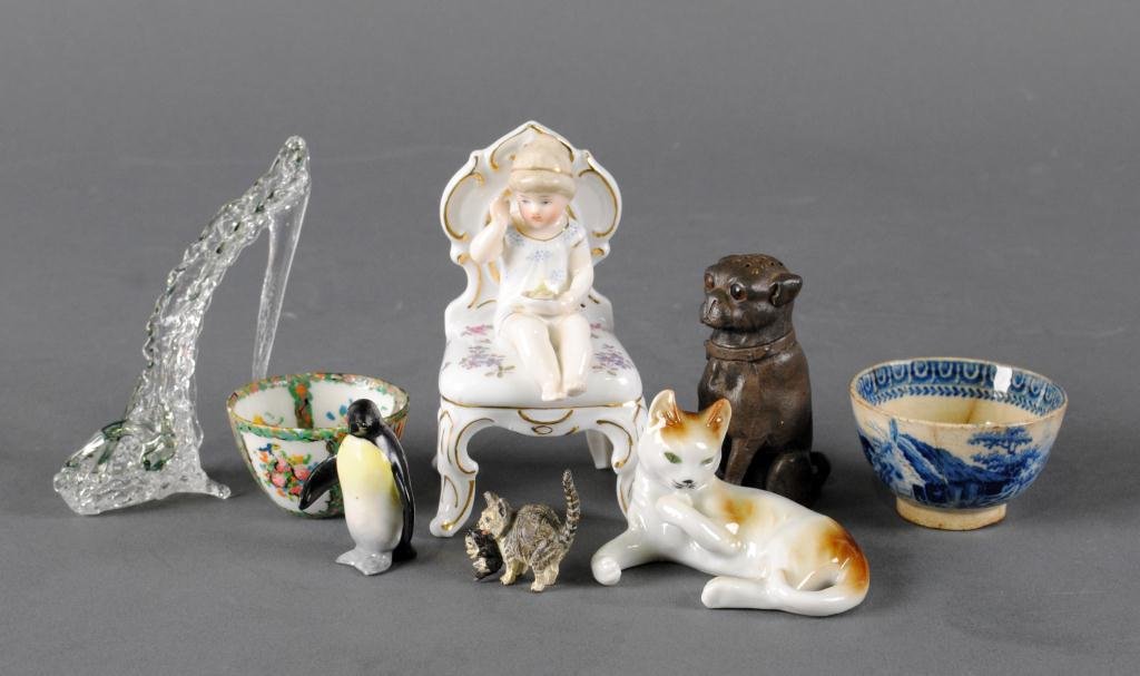 8-PIECE ASSORTED MINIATURE GROUP: ceramics include an antique blue & white stoneware bowl, a baby seated in a chair, a penguin marked Germany, a cat marked Germany, and a Chinese-style bowl, metalware includes a dog-form shaker with g