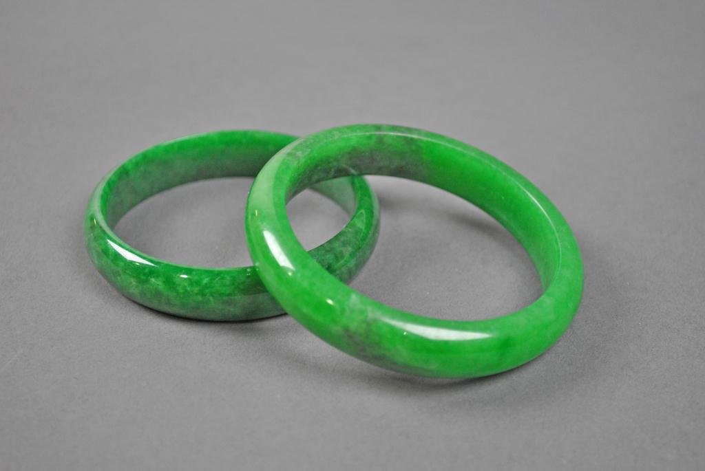 TWO JADE BANGLES: TWO JADE BANGLES