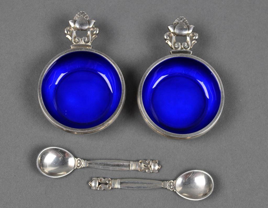 PAIR OF GEORG JENSEN SILVER ENAMELED ACORN SALTS: in cobalt, with matching spoons, Georg Jensen post 1945 mark, also marked 'Dessin' with oval dots surrounding 'JR', pattern designed by Johan Rohde, 1.5in.