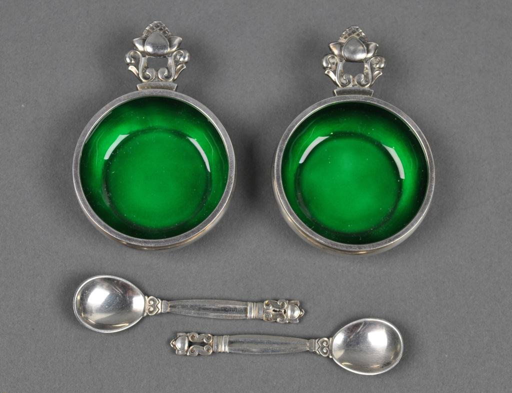 PAIR OF GEORG JENSEN SILVER ENAMELED ACORN SALTS: in green, with matching spoons, Georg Jensen post 1945 mark, also marked 'Dessin' with oval dots surrounding 'JR', pattern designed by Johan Rohde, 1.5in.