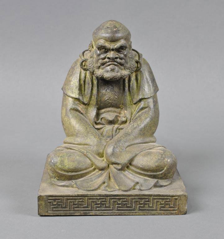 CHINESE BRONZE LOHAN FIGURE: depicted seated in a hooded robe, 9in.