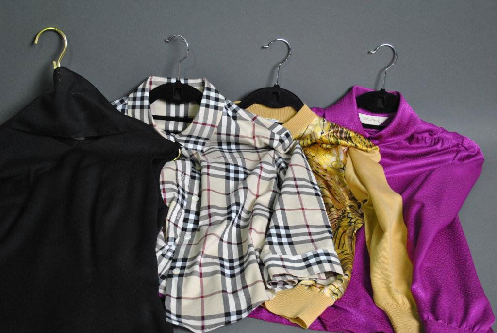 LADIES COUTURE - FOUR PIECES: including a silk and wool Ferragamo sweater size M, a Carolina Herrera black dress size 12, a Burberry button-down blouse, and a St. John polyester blouse size 8