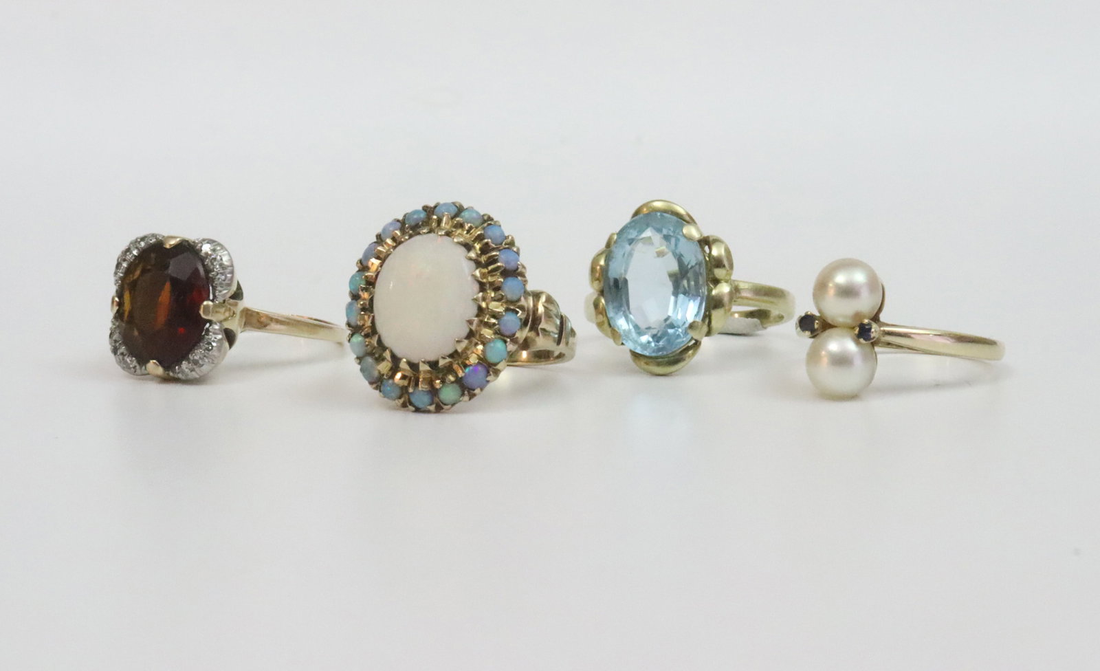 (4) GOLD RINGS (1 of 2)